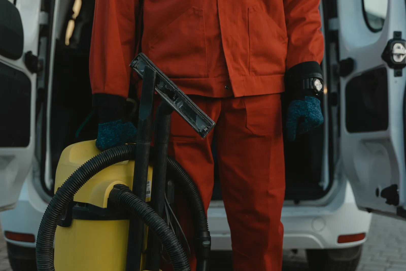 Professional cleaning equipment being prepared for work